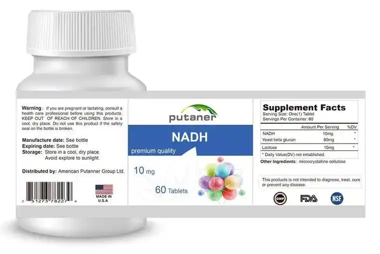 A slice of keto vanilla cake served on a white plate with a fork.